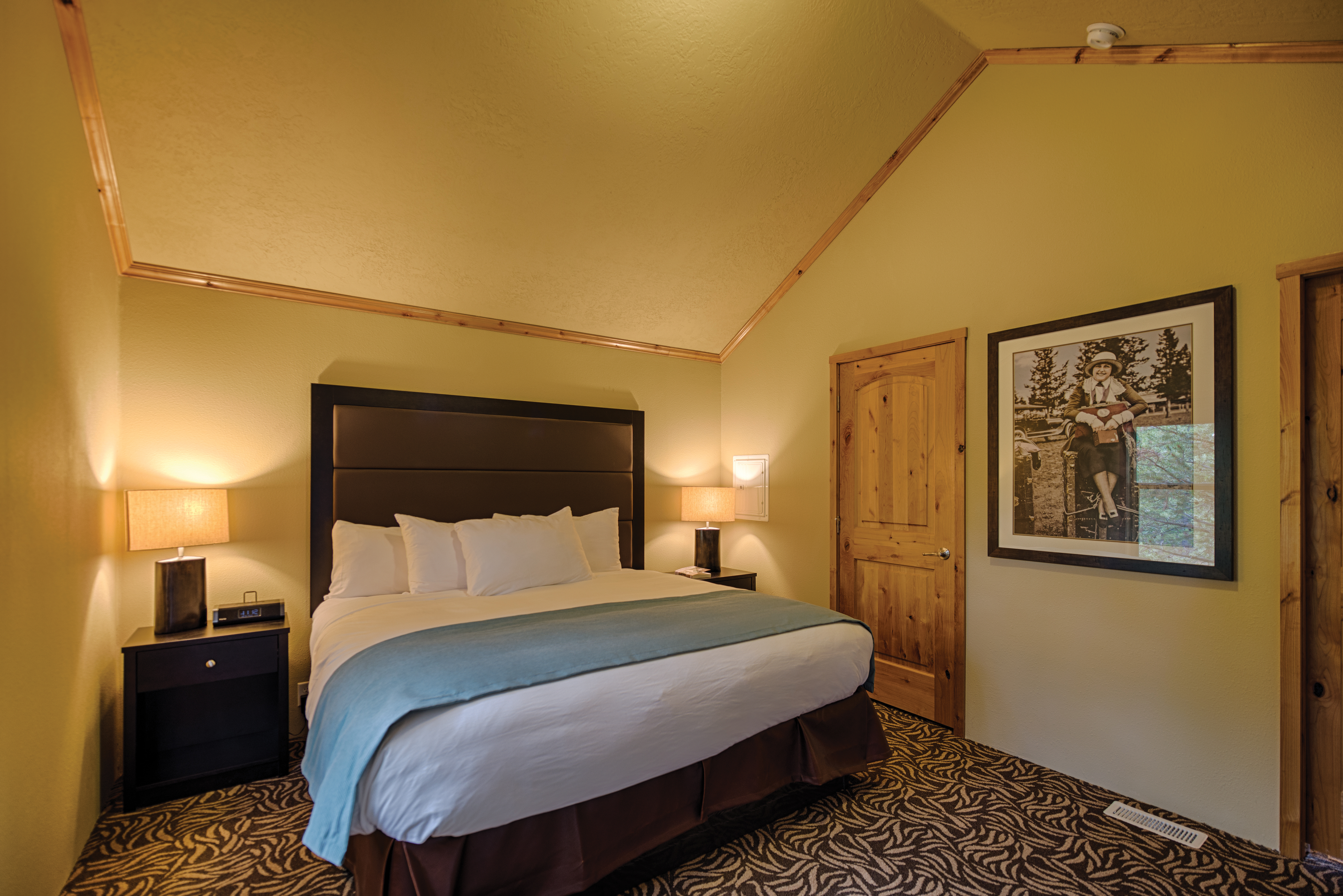 King guestroom interior at the Explorer Cabins at Yellowstone in West Yellowstone, MT
